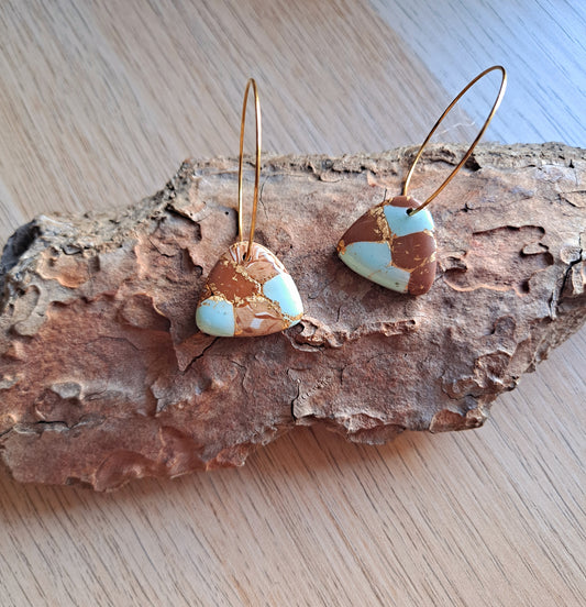 aretes dorados largos